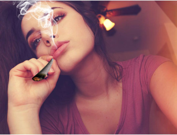 Kylie Quinn smoking a joint